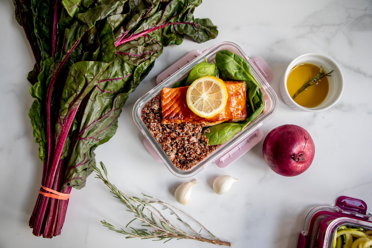 Prepared protein portions with cooking containers