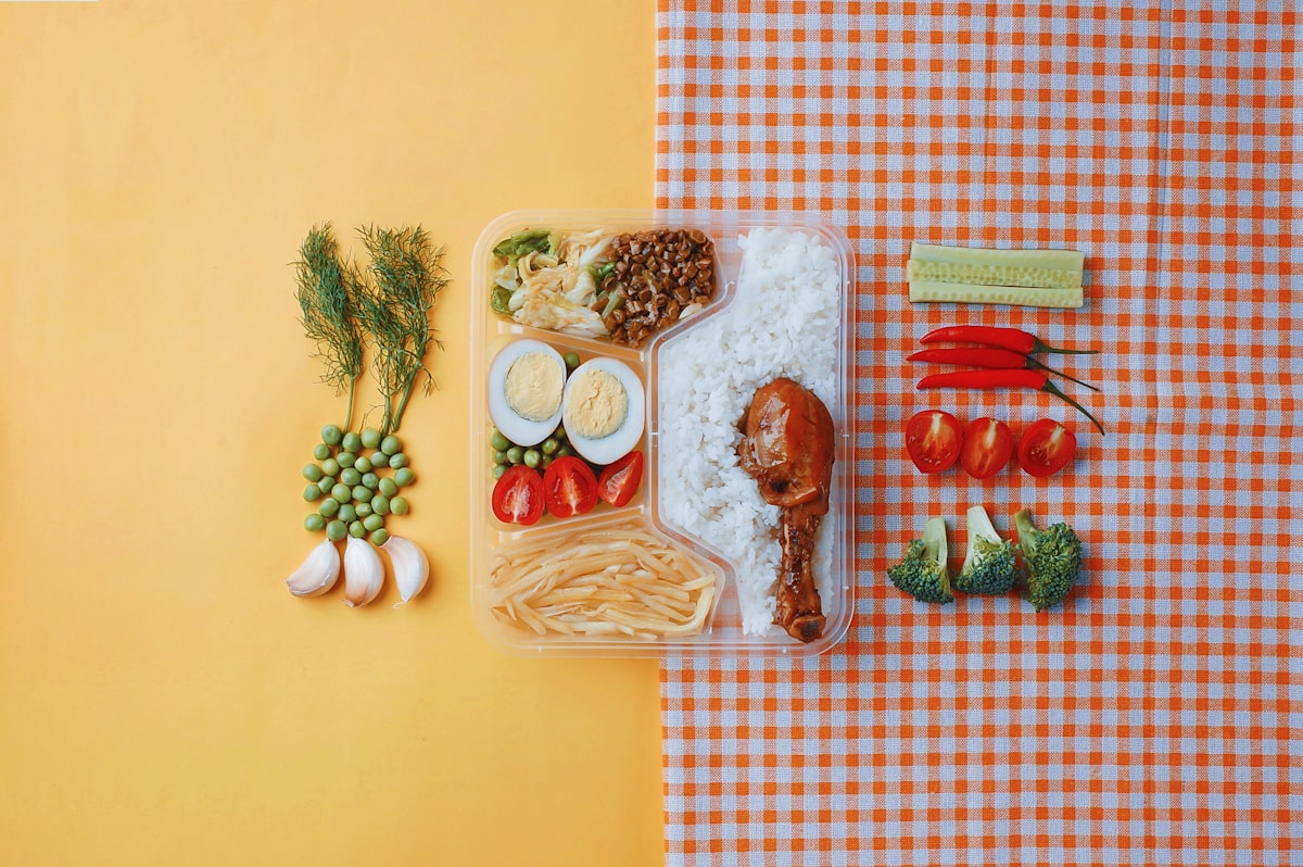 Vegetable prep containers with chopped and organized ingredients